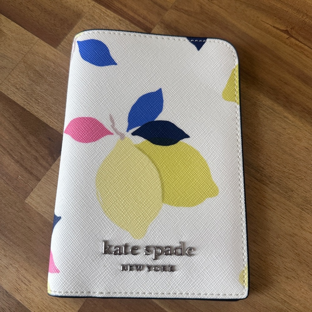 Kate Spade White Passport Holder with Lemon and Leaf Design